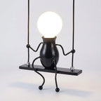 Wall Lamp | Playful Swinging Silhouette & Metal Construction | E26/E27 Compatible